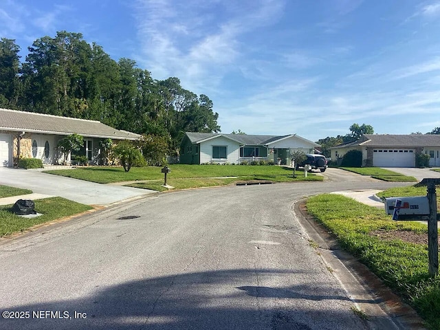 819 Helmsman Way, Palm Harbor, FL 34685 - view of asphalt road featuring curbs