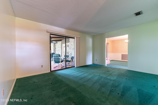 5042 Brighton Dr, Jacksonville, FL 32217 - carpeted spare room with a textured ceiling