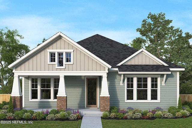 5898 Timber Pines Dr, Jacksonville, FL 32224 - view of front of house featuring board and batten siding and a shingled roof