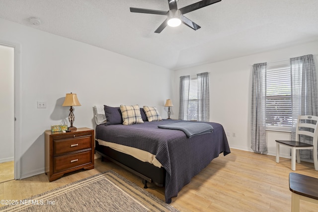 1853 Weston Cir, Fleming Island, FL 32003 - bedroom with light wood-style floors, ceiling fan, and lofted ceiling