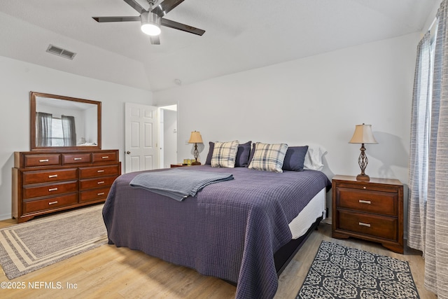 1853 Weston Cir, Fleming Island, FL 32003 - bedroom with light wood-type flooring and ceiling fan
