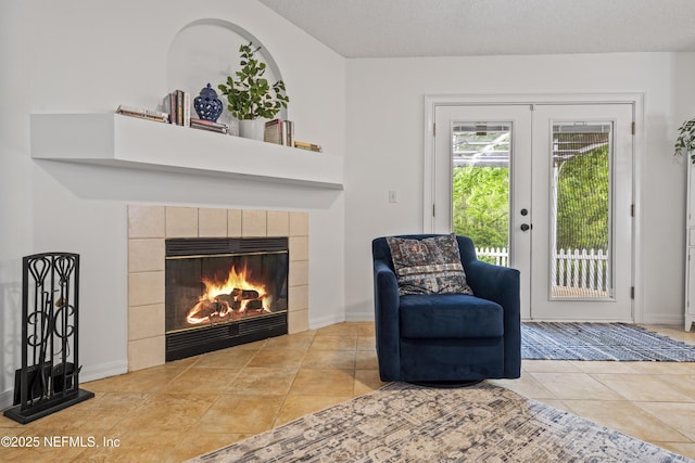 1853 Weston Cir, Fleming Island, FL 32003 - living area with a tiled fireplace and tile patterned flooring