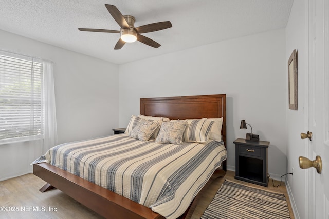 1853 Weston Cir, Fleming Island, FL 32003 - bedroom with wood finished floors and ceiling fan