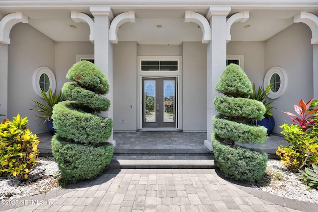452 Deer Valley Dr, Ponte Vedra, FL 32081 - property entrance featuring french doors and stucco siding