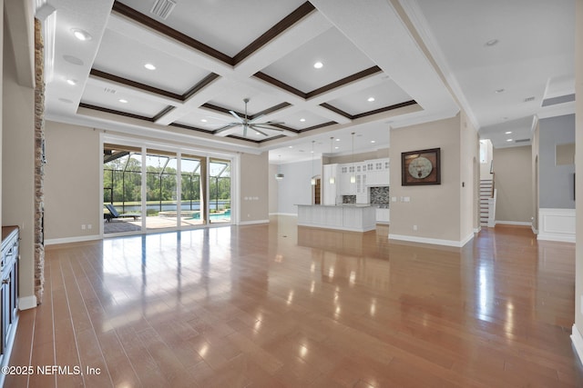 452 Deer Valley Dr, Ponte Vedra, FL 32081 - unfurnished living room with a ceiling fan, coffered ceiling, beam ceiling, light wood finished floors, and ornamental molding