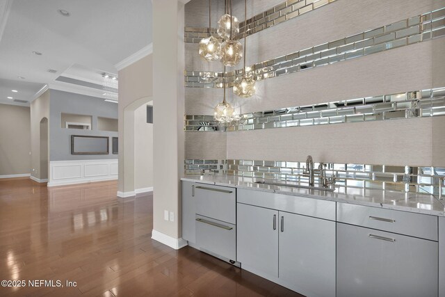 452 Deer Valley Dr, Ponte Vedra, FL 32081 - bar featuring ornamental molding, a chandelier, dark wood-type flooring, recessed lighting, and dishwashing machine