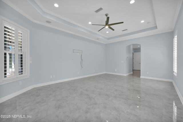 452 Deer Valley Dr, Ponte Vedra, FL 32081 - empty room with a tray ceiling, arched walkways, a ceiling fan, ornamental molding, and recessed lighting
