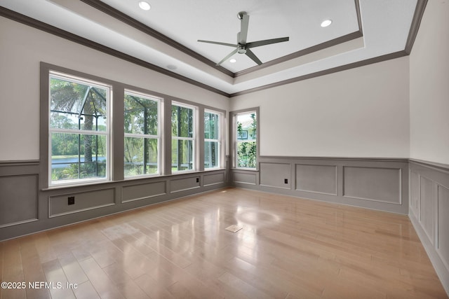 452 Deer Valley Dr, Ponte Vedra, FL 32081 - empty room with crown molding, a decorative wall, ceiling fan, a raised ceiling, and a wainscoted wall