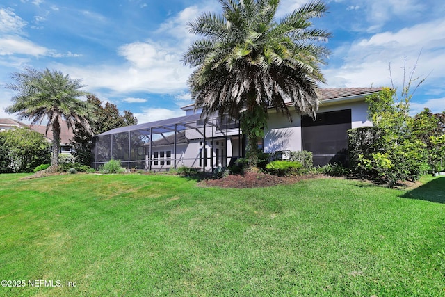 452 Deer Valley Dr, Ponte Vedra, FL 32081 - view of green lawn featuring an attached garage and glass enclosure