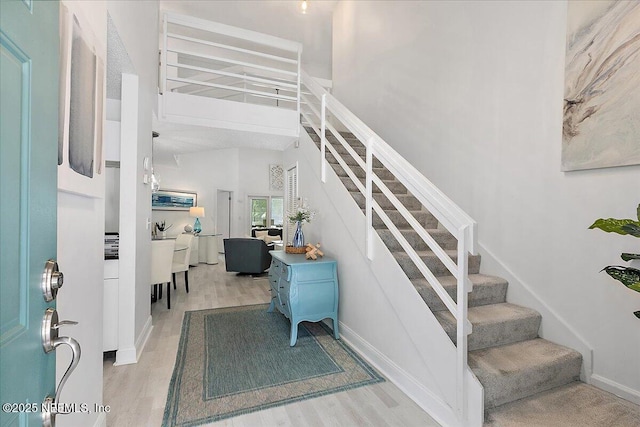 35 Turtleback Trl, Ponte Vedra Beach, FL 32082 - staircase with wood finished floors and a high ceiling