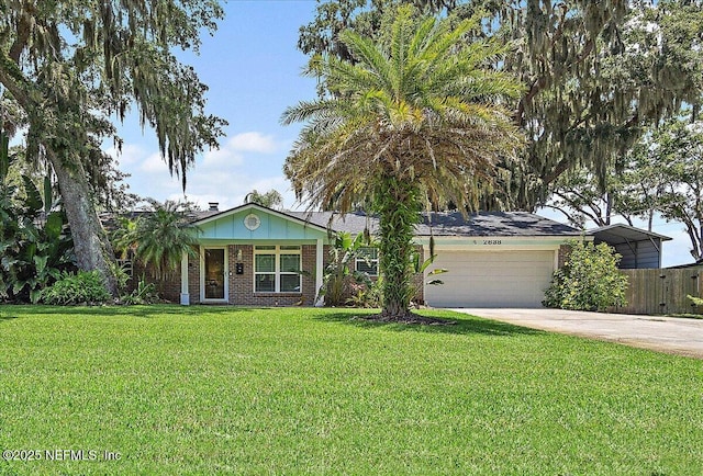 2638 W End St, Jacksonville, FL 32233 - ranch-style house featuring brick siding, an attached garage, and concrete driveway