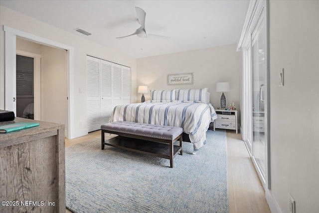 2638 W End St, Jacksonville, FL 32233 - bedroom with light wood-style flooring, a closet, and ceiling fan