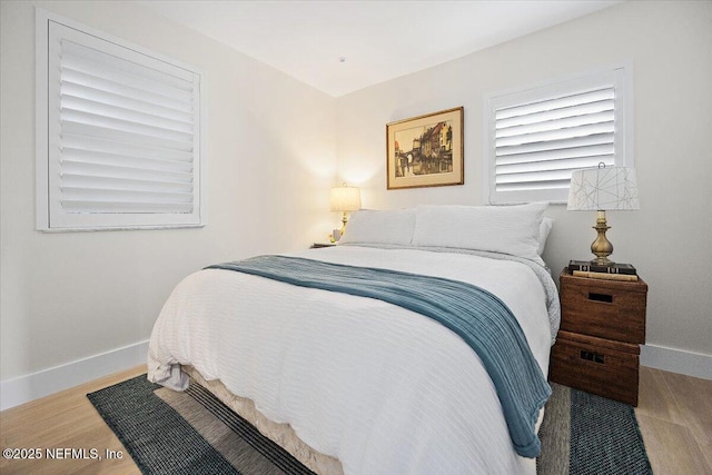 2638 W End St, Jacksonville, FL 32233 - bedroom featuring wood finished floors and baseboards