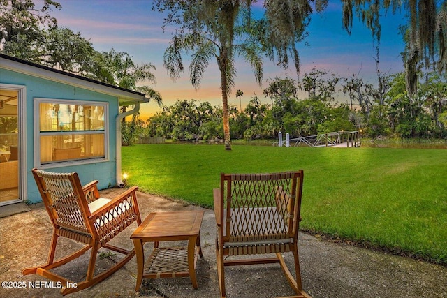 2638 W End St, Jacksonville, FL 32233 - view of green lawn featuring a patio area