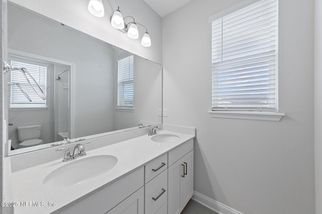 117 Redbud Ln, Yulee, FL 32097 - bathroom with double vanity and toilet