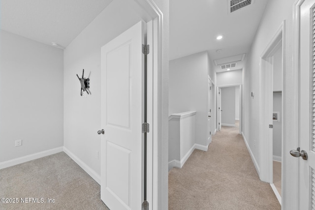 117 Redbud Ln, Yulee, FL 32097 - hallway featuring light carpet, an upstairs landing, and recessed lighting