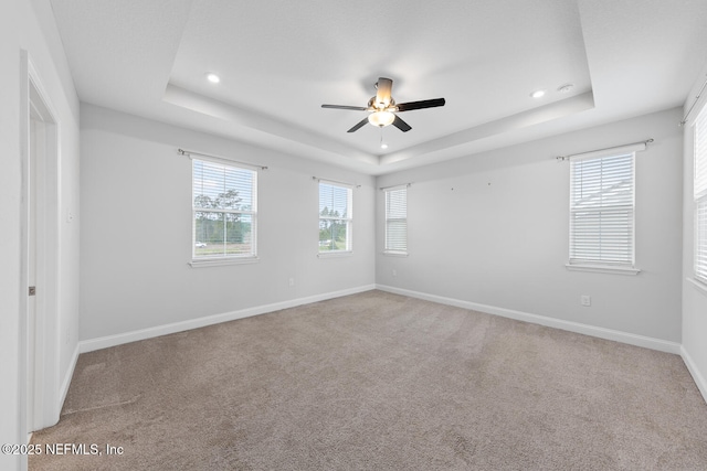 117 Redbud Ln, Yulee, FL 32097 - carpeted spare room featuring a raised ceiling, ceiling fan, healthy amount of natural light, and recessed lighting