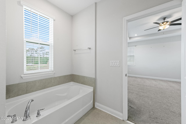 117 Redbud Ln, Yulee, FL 32097 - bathroom featuring a bath, plenty of natural light, and ceiling fan