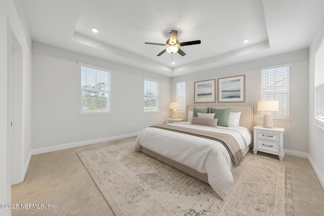 117 Redbud Ln, Yulee, FL 32097 - bedroom with a raised ceiling, light carpet, recessed lighting, and a ceiling fan