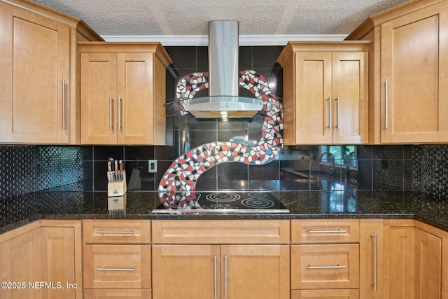 136 Sherwood Ave, Saint Augustine, FL 32084 - kitchen featuring wall chimney range hood, black electric cooktop, a textured ceiling, dark stone counters, and backsplash