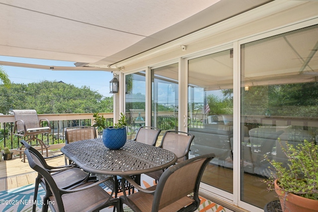136 Sherwood Ave, Saint Augustine, FL 32084 - wooden terrace with outdoor dining area