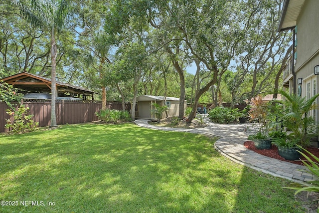 136 Sherwood Ave, Saint Augustine, FL 32084 - fenced backyard featuring a shed