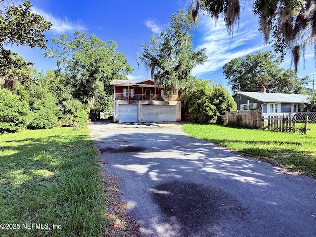 427 Crestwood St, Jacksonville, FL 32208 - view of front of home featuring asphalt driveway