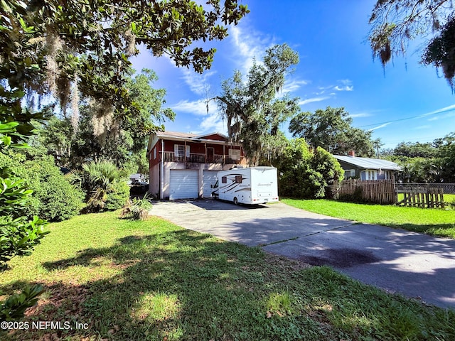 427 Crestwood St, Jacksonville, FL 32208 - view of front of home featuring concrete driveway and a garage
