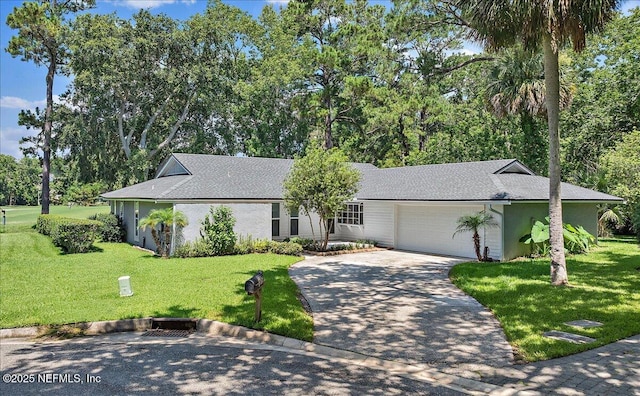 105 Lucina Ln, Ponte Vedra Beach, FL 32082 - view of front facade with a garage, concrete driveway, a front lawn, and view of wooded area