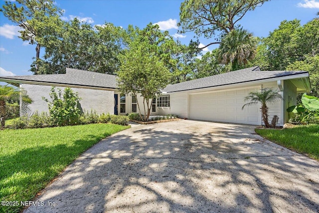 105 Lucina Ln, Ponte Vedra Beach, FL 32082 - view of front facade featuring an attached garage, driveway, and a front lawn