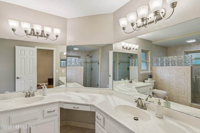 12137 Dividing Oaks Trl E, Jacksonville, FL 32223 - bathroom featuring a stall shower, double vanity, and tile patterned flooring