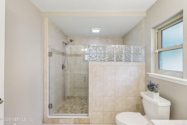 12137 Dividing Oaks Trl E, Jacksonville, FL 32223 - bathroom with toilet and a shower stall