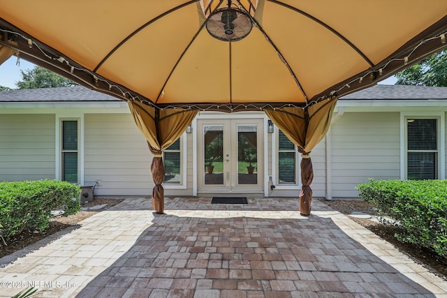12137 Dividing Oaks Trl E, Jacksonville, FL 32223 - view of patio / terrace featuring a gazebo and french doors