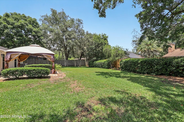 12137 Dividing Oaks Trl E, Jacksonville, FL 32223 - fenced yard featuring a gazebo
