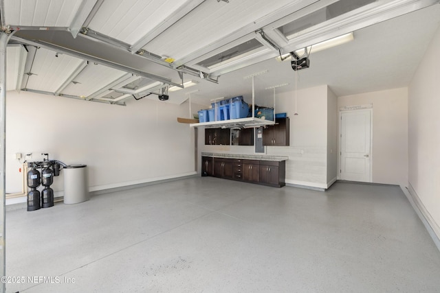 651 Rum Runner Way, Saint Johns, FL 32259 - garage featuring a garage door opener and baseboards