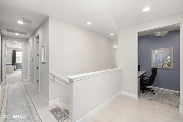 651 Rum Runner Way, Saint Johns, FL 32259 - corridor with an upstairs landing, a desk, light wood-style flooring, and recessed lighting