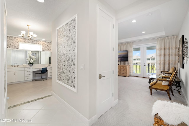 651 Rum Runner Way, Saint Johns, FL 32259 - hall with a desk, a chandelier, french doors, recessed lighting, and wallpapered walls
