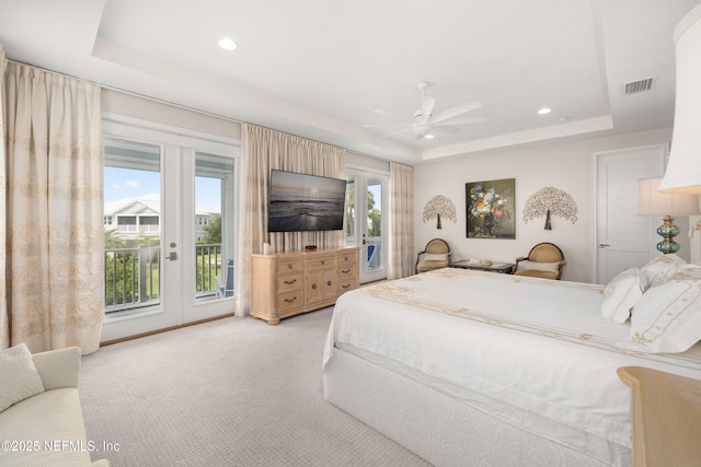 651 Rum Runner Way, Saint Johns, FL 32259 - bedroom featuring a tray ceiling, access to exterior, light carpet, recessed lighting, and ceiling fan