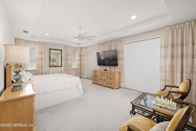 651 Rum Runner Way, Saint Johns, FL 32259 - bedroom featuring a tray ceiling, light colored carpet, recessed lighting, and ceiling fan