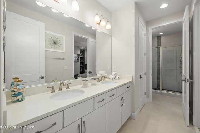 651 Rum Runner Way, Saint Johns, FL 32259 - full bath featuring double vanity, a shower stall, tile patterned flooring, and recessed lighting