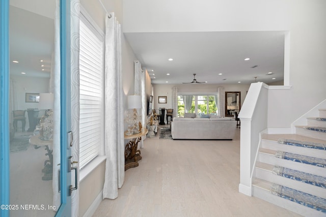 651 Rum Runner Way, Saint Johns, FL 32259 - living room featuring light wood-style floors, recessed lighting, a ceiling fan, and stairway