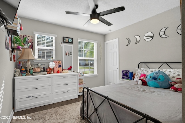 665 Flach Dr, Saint Johns, FL 32259 - bedroom with dark wood finished floors and ceiling fan