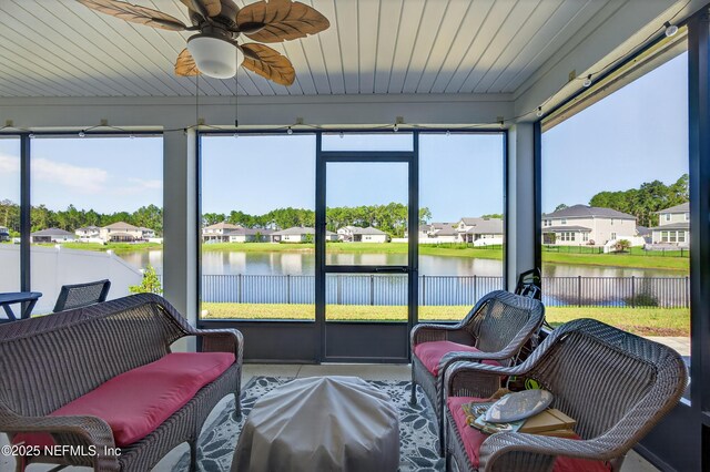 665 Flach Dr, Saint Johns, FL 32259 - sunroom featuring ceiling fan, a water view, an outdoor hangout area, and a residential view