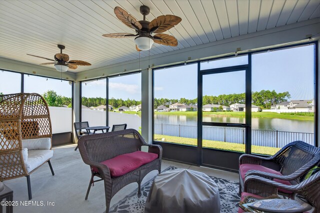 665 Flach Dr, Saint Johns, FL 32259 - sunroom with healthy amount of natural light, a ceiling fan, and a water view