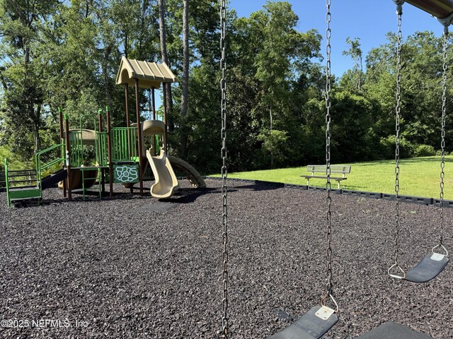 665 Flach Dr, Saint Johns, FL 32259 - communal playground featuring a yard
