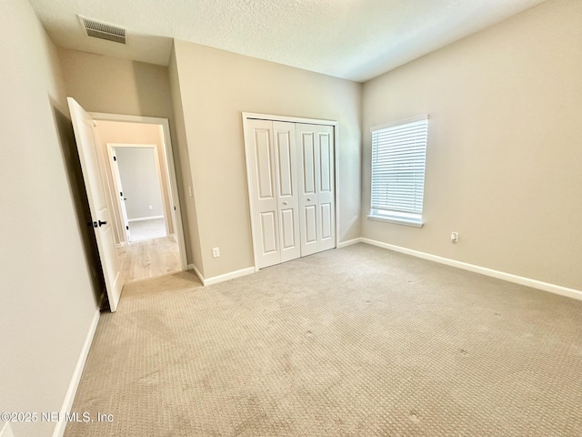 356 Bermudez Way, Saint Augustine, FL 32095 - unfurnished bedroom featuring carpet and a closet