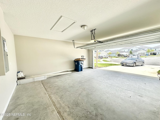 356 Bermudez Way, Saint Augustine, FL 32095 - garage featuring a residential view and baseboards