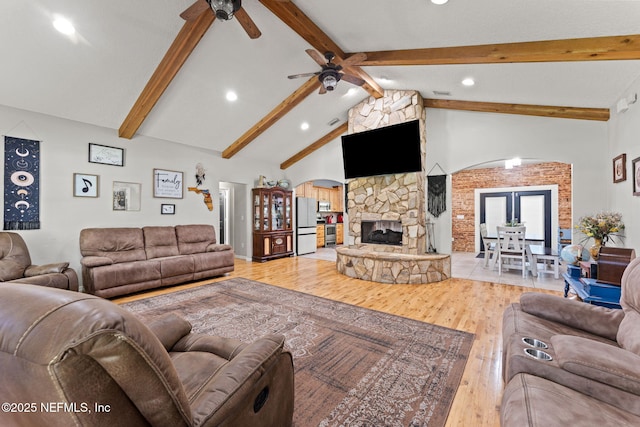 34100 Old Baldwin Rd, Callahan, FL 32011 - living room featuring ceiling fan, light wood-type flooring, recessed lighting, and a stone fireplace