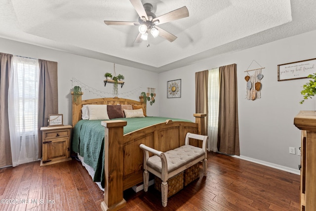 34100 Old Baldwin Rd, Callahan, FL 32011 - bedroom with hardwood / wood-style floors, a textured ceiling, and a ceiling fan