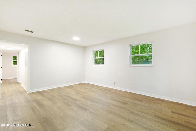 9340 Norfolk Blvd, Jacksonville, FL 32208 - empty room with light wood-style flooring and recessed lighting